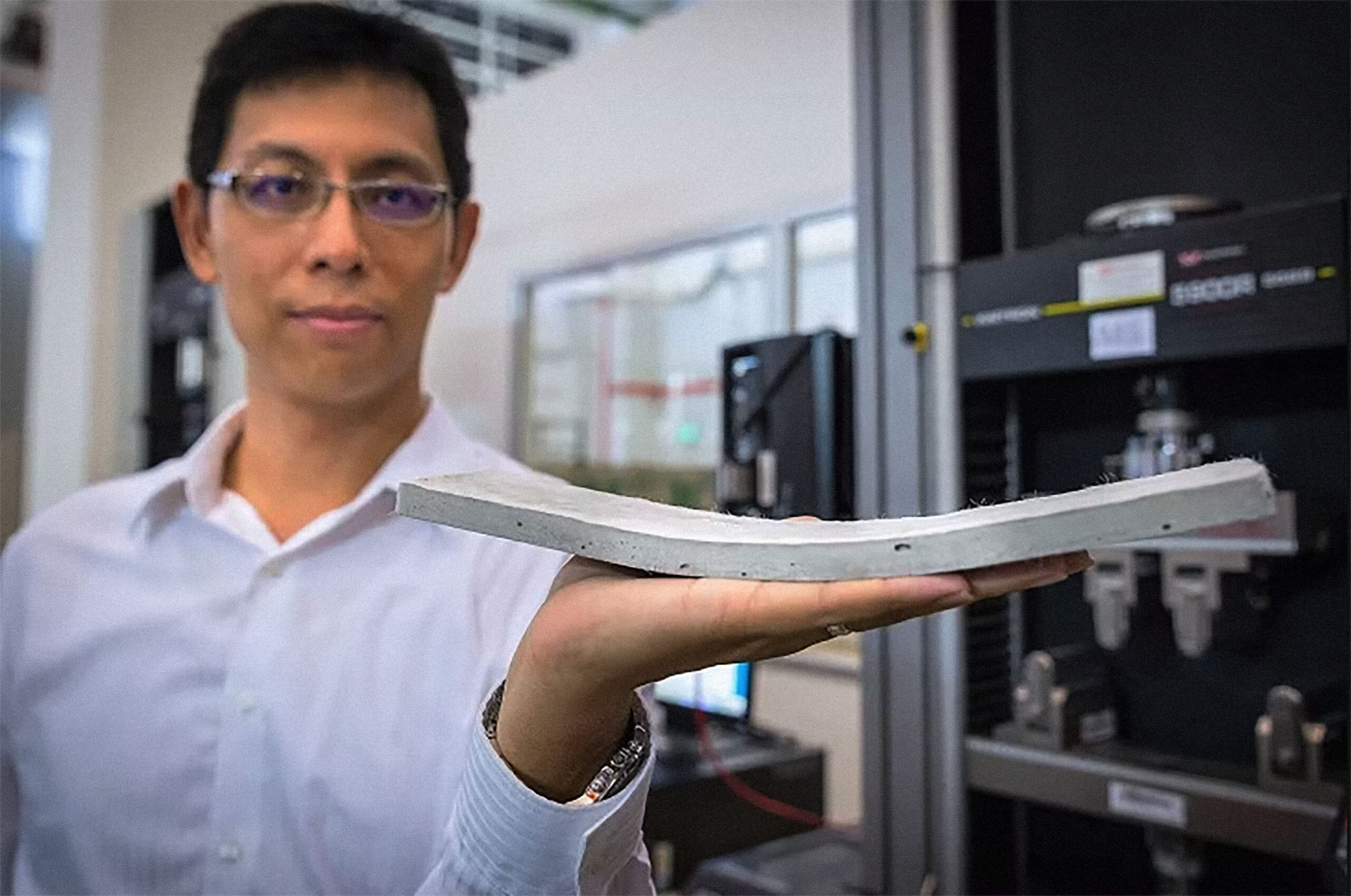 Man Holding Flexible Concrete