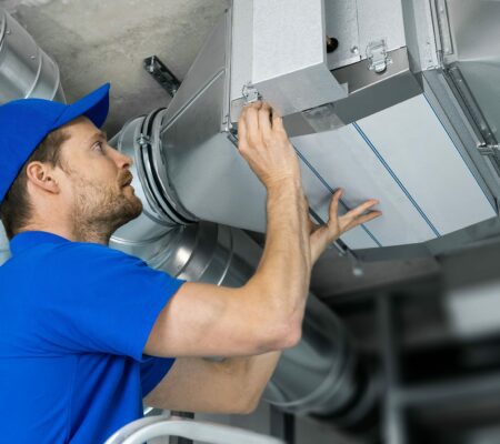 Man working on HVAC system